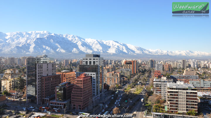 Santiago, Chile with blue sky and snow on the Andes mountains. View from Escuela Militar en Las Condes, Santiago - Woodward Culture
